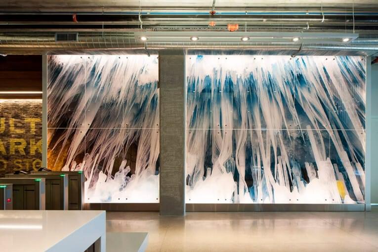 A piece of architectural glass artwork designed by Suzanne Tick, photographed by Bonnie Edelman, and printed on the glass in the lobby of 1k Fulton by Skyline Design architectural glass manufacturer.