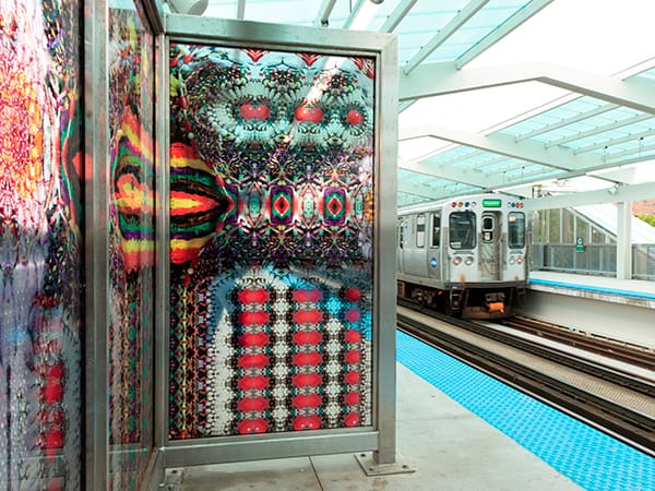 Final installation of the abstract custom glass windbreaks on the platform and wall-cladding in the station at the CTA Green Line Garfield stop. Artwork designed by Chicago artists Nick Cave and Bob Faust, photographed by Scott Shigley, and printed on glass by Skyline Design.
