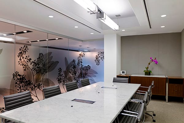A botanical custom glass Vitracolor Back-Painted on a glassboard in the office of a Consulting Corporate Company by Skyline Design, the industry-leading architectural glass manufacturer.