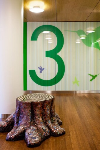 3 birds abstract custom glass artwork, wall-cladding in Randall Children's Hospital at Legacy Emanuel, and printed on a glass door partition by Skyline Design architectural glass manufacturer.