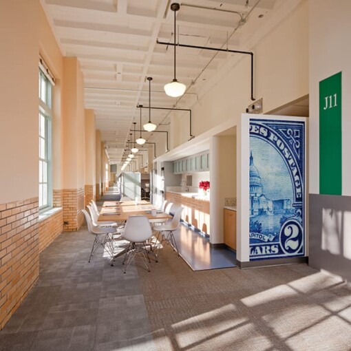 The final installation of a custom glass artwork, wall-cladding in Martin Luther King Jr. Federal Building, and printed on glass by Skyline Design architectural glass manufacturer.