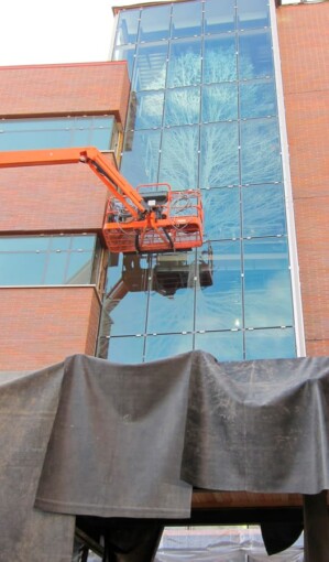 ongoing constructions of the botanical pattern custom glass on the glass partition of Lehigh University BudInside by Skyline Design architectural glass manufacturer