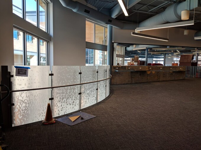 Ongoing custom glass construction on the exterior wall of Lenexa City Center Library by Skyline Design, the industry-leading architectural glass manufacturer.