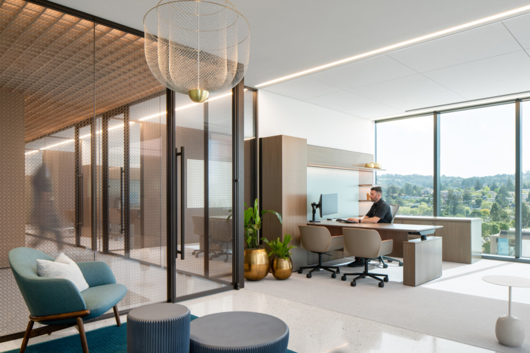 A geometric custom glass pattern design by Gensler and printed on glass partitions using Mosaic Callisto by skyline Design glass manufacturing company and installed on glass partitions throughout the Westbridge Capital office by Bay Area Solar Control